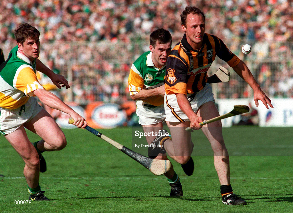 13 September 1998; Andy Comerford of Kilkenny in action against Johnny Pilkingham of Offaly during the Guinness All-Ireland Senior Hurling Championship Final between Offaly and Kilkenny at Croke Park in Dublin. Photo by David Maher/Sportsfile