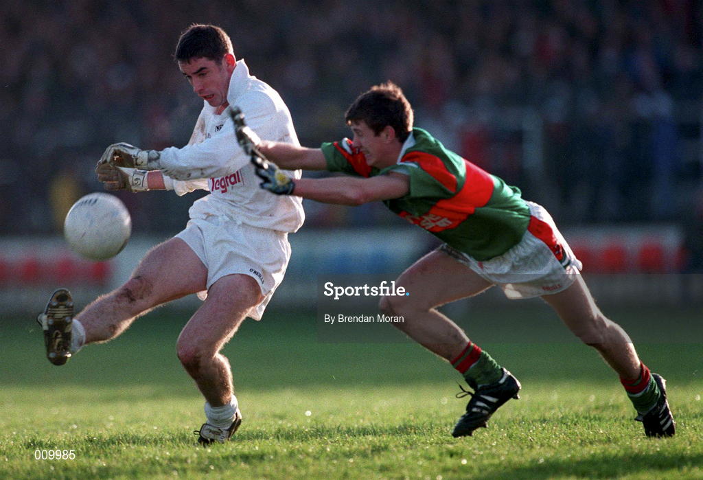 29 November 1998; Anthony Rainbow of Kildare is tackled by Aidan Higgins of Mayo during the Church & General National Football League match between Kildare and Mayo at St Conleth's Park in Newbridge, Kildare. Photo by Brendan Moran/Sportsfile