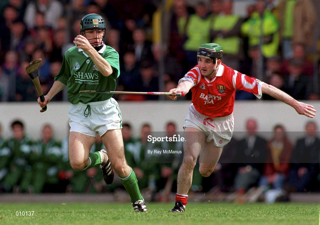26 May 1996; Damien Quigley of Limerick in action against Timmy Kelleher of Cork during the Guinness Munster Senior Hurling Championship Quarter-Final match between Cork and Limerick at Pairc Ui Chaoimh in Cork. Photo by Ray McManus/Sportsfile