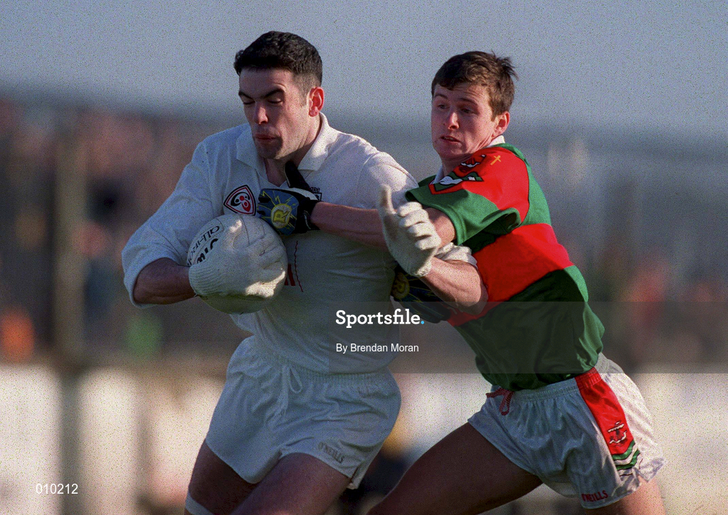 29 November 1998; Dermot Earley of Kildare holds off the challenge of Aidan Higgins of Mayo during the Church & General National Football League match between Kildare and Mayo at St Conleth's Park in Newbridge, Kildare. Photo by Brendan Moran/Sportsfile