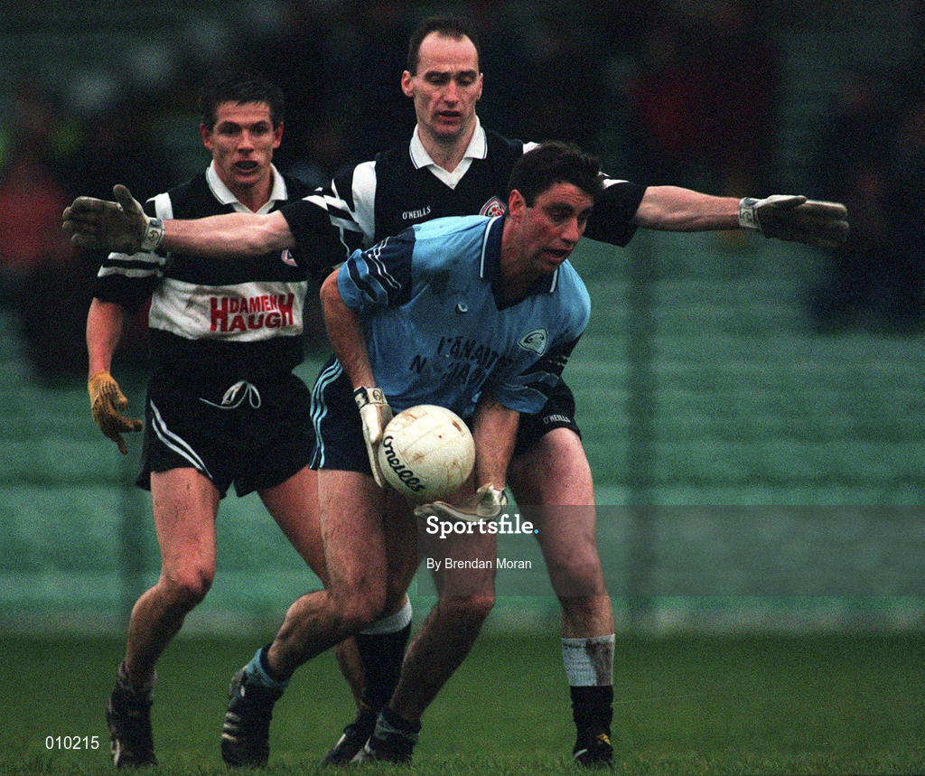 13 December 1998; Derry Foley of Moyle Rovers in action against Francis McInerney of Doonbeg during the AIB Munster Senior Club Football Championship Final between Doonbeg and Moyle Rovers at the Gaelic Grounds in Limerick. Photo by Brendan Moran/Sportsfile