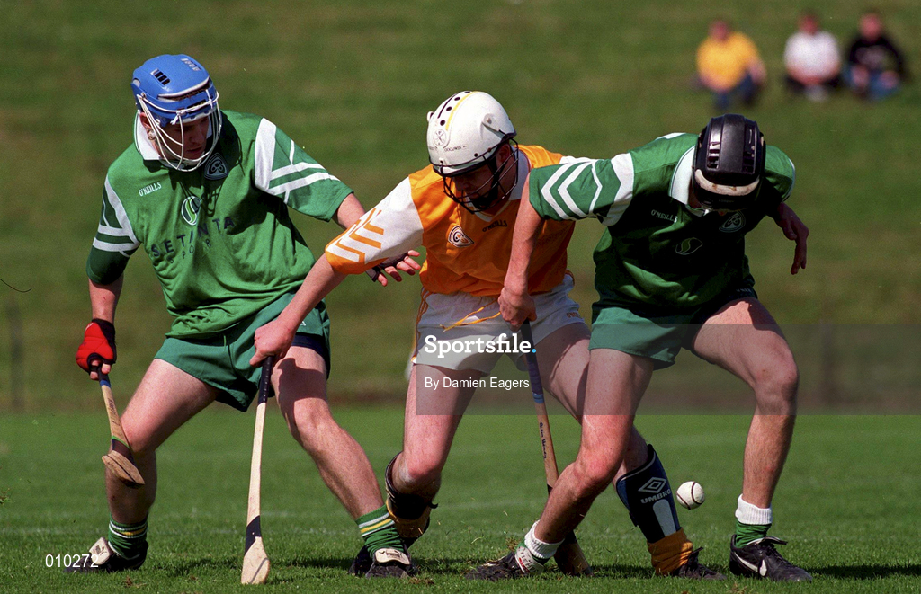14 June 1998;  Eoin Colgan of Antrim in action against Eoin Quaine, left, and Aidan Heany of London during the Guinness Ulster Senior Hurling Championship semi-final match between Antrim and London at Casement Park in Belfast. Photo by Damien Eagers/Sportsfile