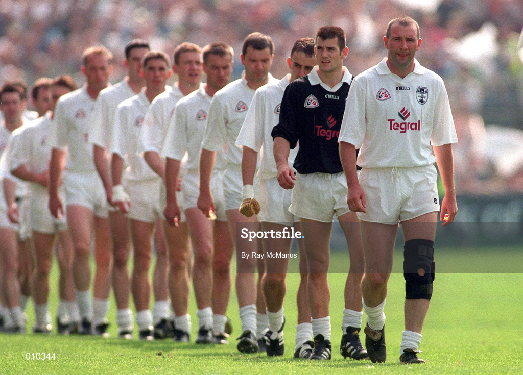 30 August 1998; Kildare captain Glenn Ryan leads his team-mates during the pre-match parade prior to the All-Ireland Senior Football Championship Semi-Final match between Kildare and Kerry at Croke Park in Dublin. Photo by Ray McManus/Sportsfile