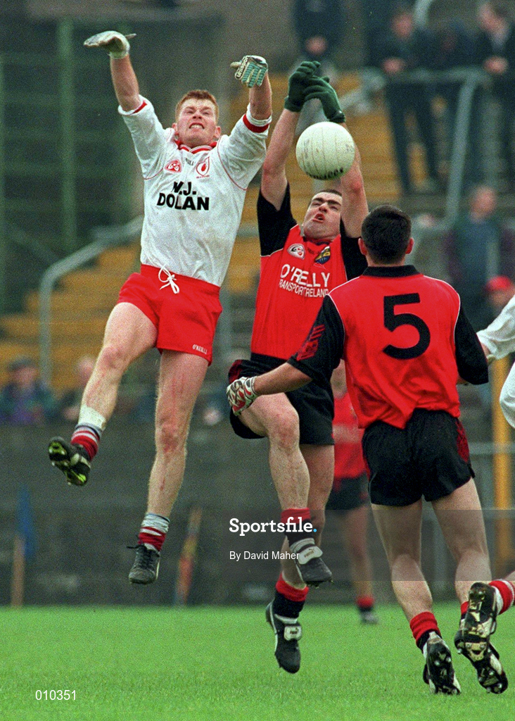 18 May 1997; Greg McCartan, supported by Down team-mate Daniel Flynn, 5, competes for possession with Jody Gormley of Tyrone during the Bank of Ireland Ulster Senior Football Championship preliminary round at St. Tiernach's Park in Clones, Monaghan. Photo by David Maher/Sportsfile