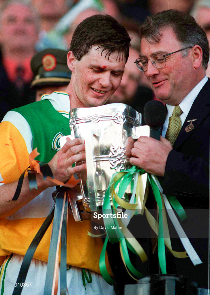 13 September 1998; Offaly captain Hubert Rigney receives the Liam MacCarthy Cup from GAA President Joe McDonagh following the Guinness All-Ireland Senior Hurling Championship Final between Offaly and Kilkenny at Croke Park in Dublin. Photo by David Maher/Sportsfile