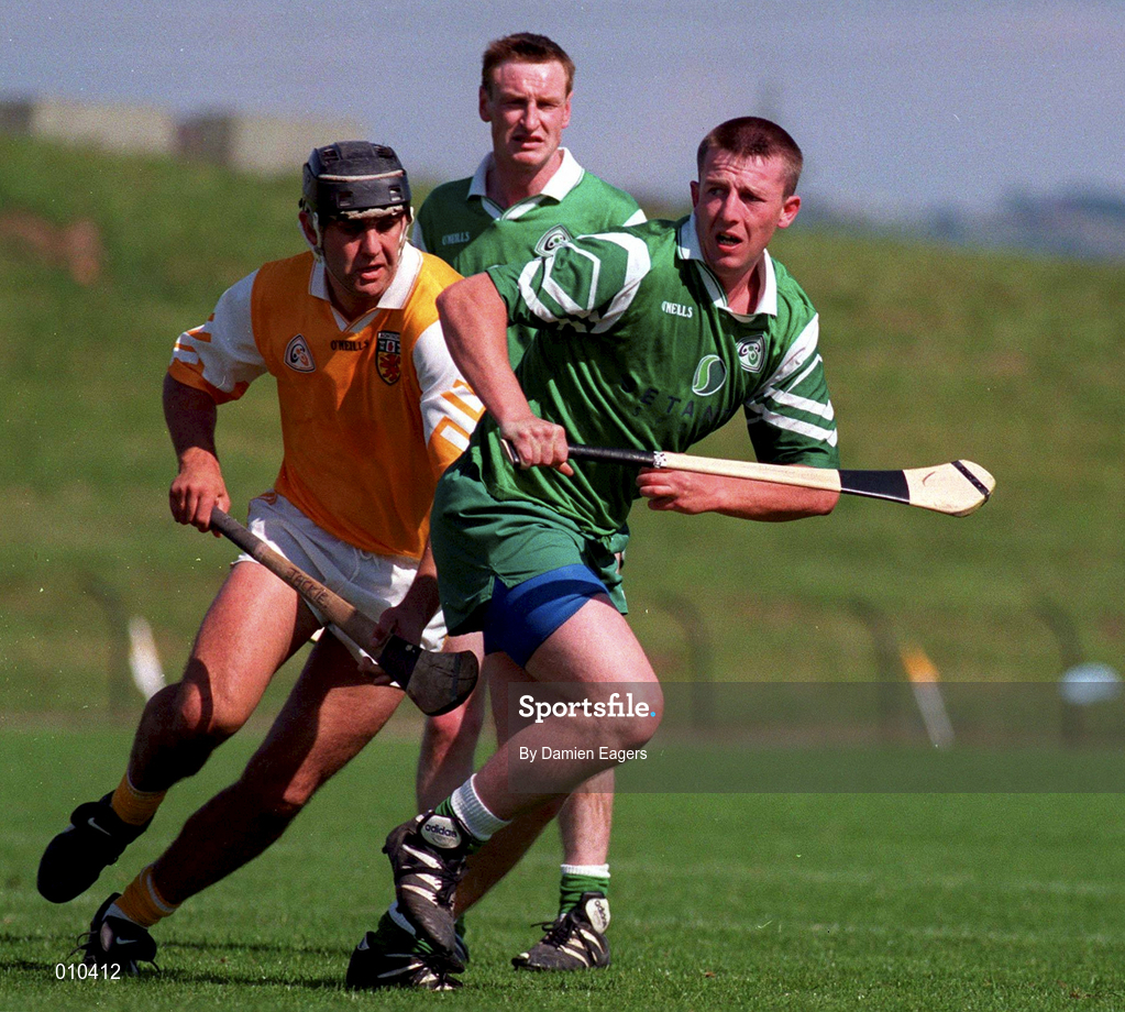 14 June 1998; Jimmy Moloney of London in action against John Carson of Antrim during the Guinness Ulster Senior Hurling Championship semi-final match between Antrim and London at Casement Park in Belfast. Photo by Damien Eagers/Sportsfile
