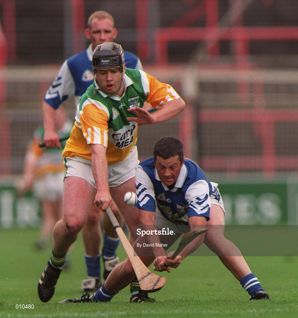 8 June 1997; John Taylor of Laois in action against Joe Errity of Offaly during the Guinness Leinster Senior Hurling Championship quarter-final match between Offaly and Laois at Croke Park in Dublin. Photo by David Maher/Sportsfile