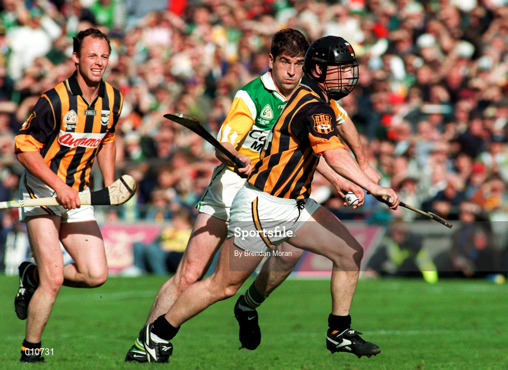 13 September 1998; PJ Delaney of Kilkenny in action against Michael Duignan of Offaly during the Guinness All-Ireland Senior Hurling Championship Final between Offaly and Kilkenny at Croke Park in Dublin. Photo by Brendan Moran/Sportsfile