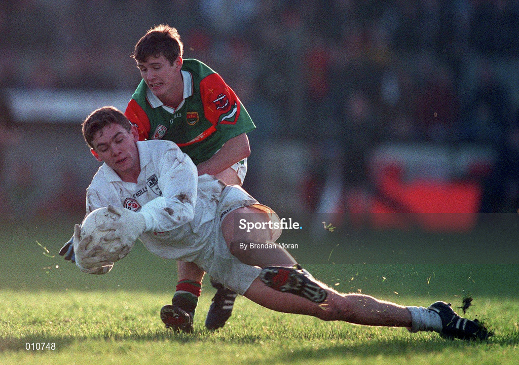 29 November 1998; Padraig Graven of Kildare is tackled by Aidan Higgins of Mayo during the Church & General National Football League match between Kildare and Mayo at St Conleth's Park in Newbridge, Kildare. Photo by Brendan Moran/Sportsfile