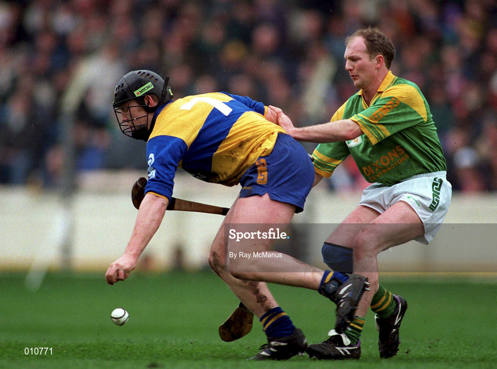 17 March 1996; Pat Hayes of Sixmilebridge in action against Jarlath Elliot of Dunloy during the All-Ireland Senior Club Hurling Championship Final match between Sixmilebridge and Dunloy at Croke Park in Dublin. Photo by Ray McManus/Sportsfile