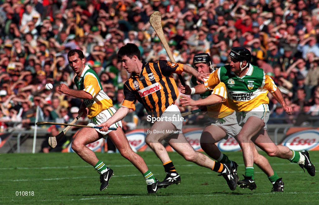 13 September 1998; Philip Larkin of Kilkenny in action against Offaly players, from left, Johnny Dooley, Billy Dooley and Joe Errity, during the Guinness All-Ireland Senior Hurling Championship Final match between Offaly and Kilkenny at Croke Park in Dublin. Photo by David Maher/Sportsfile