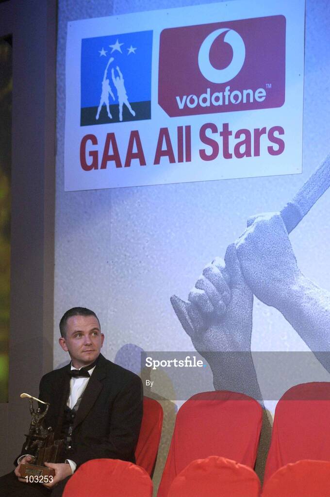29 November 2002; David Fitzgerald, Clare, pictured after receiving his All-Star award from GAA President Sean McCague and Paul Donovan, Chief Executive, Vodafone, at the VODAFONE GAA All-Star Awards in the Citywest Hotel, Dublin. Football. Hurling. Picture credit; Ray McManus / SPORTSFILE *EDI*