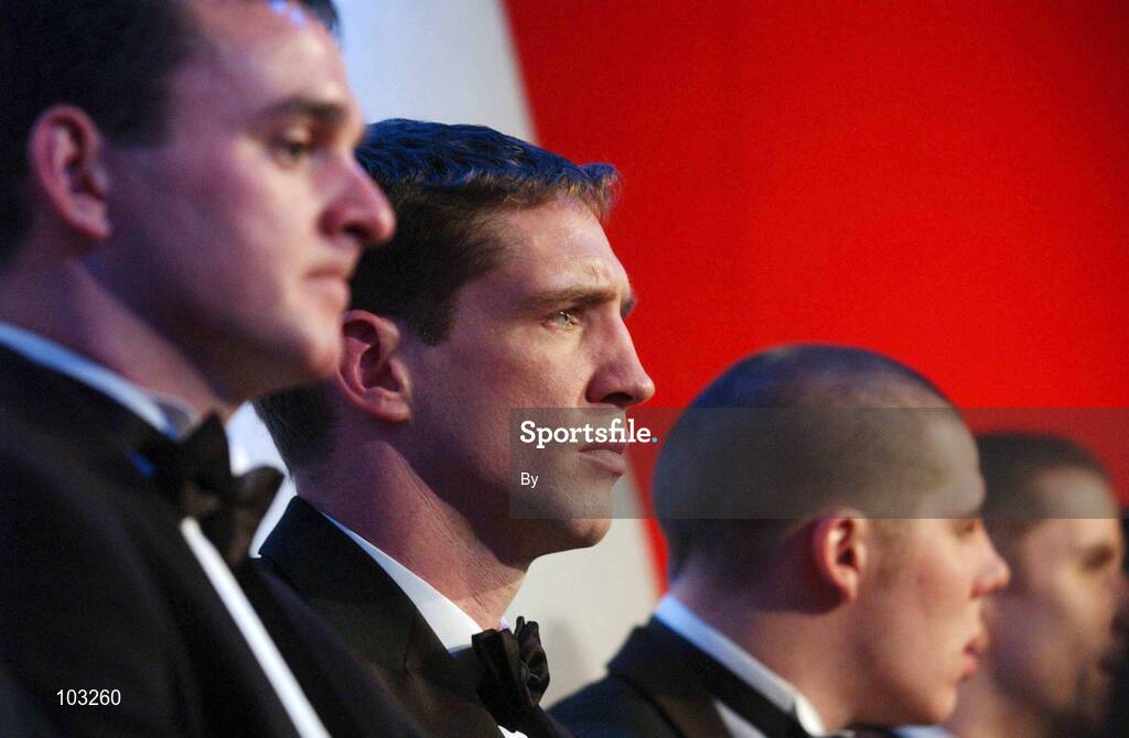 29 November 2002; Kieran McGeeney, Armagh, pictured after receiving his All-Star award from GAA President Sean McCague and Paul Donovan, Chief Executive, Vodafone, at the VODAFONE GAA All-Star Awards in the Citywest Hotel, Dublin. Football. Hurling. Picture credit; Ray McManus / SPORTSFILE *EDI*