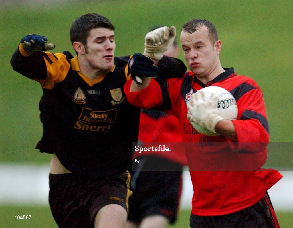 22 December 2002; Gerard Hanratty, Mattock Rangers, is tackled by Dunshaughlin's Fergal Gogan. Dunshaughlin v Mattock Rangers, Leinster Club Football Final, Pairc Tailteann, Navan, Co. Meath. Picture credit; Damien Eagers / SPORTSFILE *EDI*