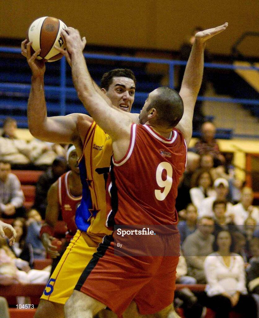 22 December 2002; Tim Welch, ITP Saints, in action against Stephen McCarthy, Neptune. ESB Superleague Basketball, Neptune v Irish Travel Partners St. Vincent's, Neptune Stadium, Cork. Picture credit; Brendan Moran / SPORTSFILE *EDI*