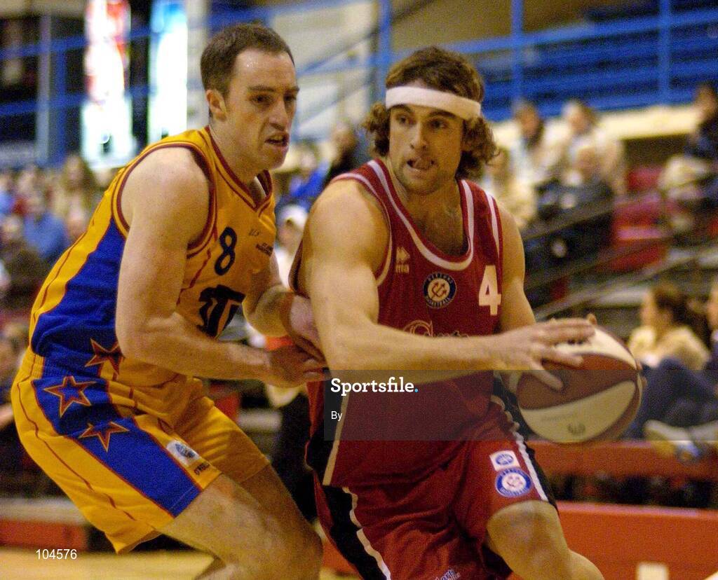 22 December 2002; Dave Langrell, Neptune, in action against David Donnelly, ITP Saints. ESB Superleague Basketball, Neptune v Irish Travel Partners St. Vincent's, Neptune Stadium, Cork. Picture credit; Brendan Moran / SPORTSFILE *EDI*