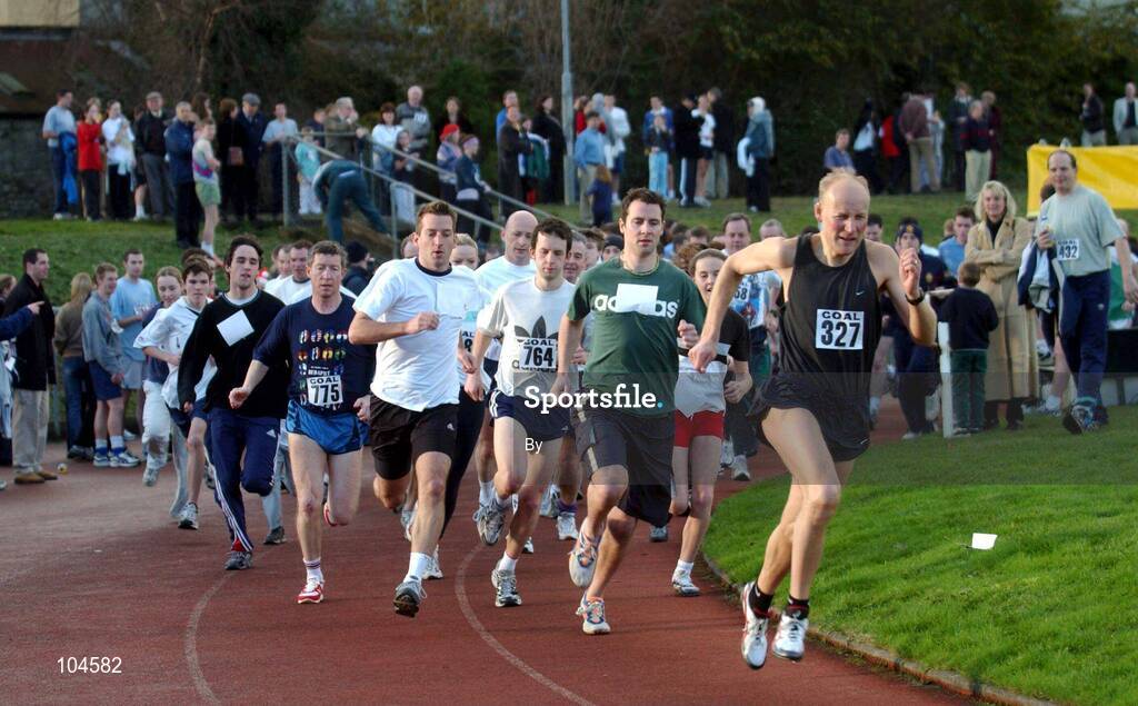 25 December 2002; Don O'Carroll, 327, leads the field on his way to win  one of the many 'Goal Miles" at Belfield on Christmas Day. Picture credit; Ray McManus / SPORTSFILE *EDI*
