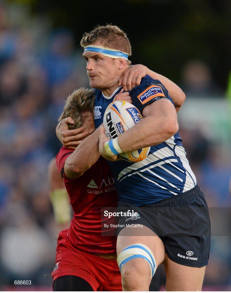22 September 2012; Jamie Heaslip, Leinster, is tackled by Tom Brown, Edinburgh. Celtic League 2012/13, Round 4, Leinster v Edinburgh, RDS, Ballsbridge, Dublin. Picture credit: Stephen McCarthy / SPORTSFILE