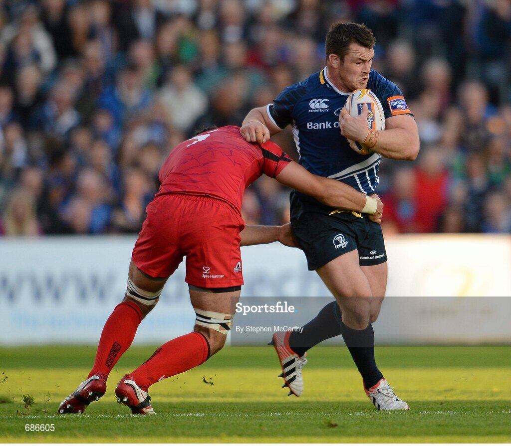 22 September 2012; Cian Healy, Leinster, is tackled by Sean Cox, Edinburgh. Celtic League 2012/13, Round 4, Leinster v Edinburgh, RDS, Ballsbridge, Dublin. Picture credit: Stephen McCarthy / SPORTSFILE