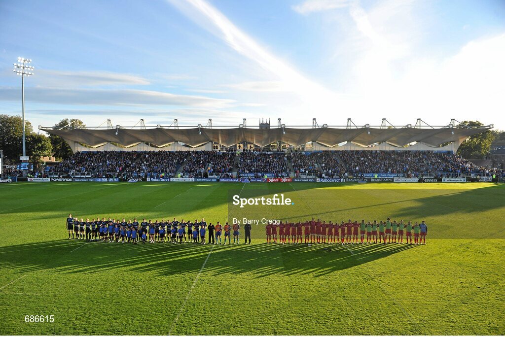 22 September 2012; Players from both teams stand during a minute silence in memory of the late Ulster Rugby player Nevin Spence. Celtic League 2012/13, Round 4, Leinster v Edinburgh, RDS, Ballsbridge, Dublin. Picture credit: Barry Cregg / SPORTSFILE