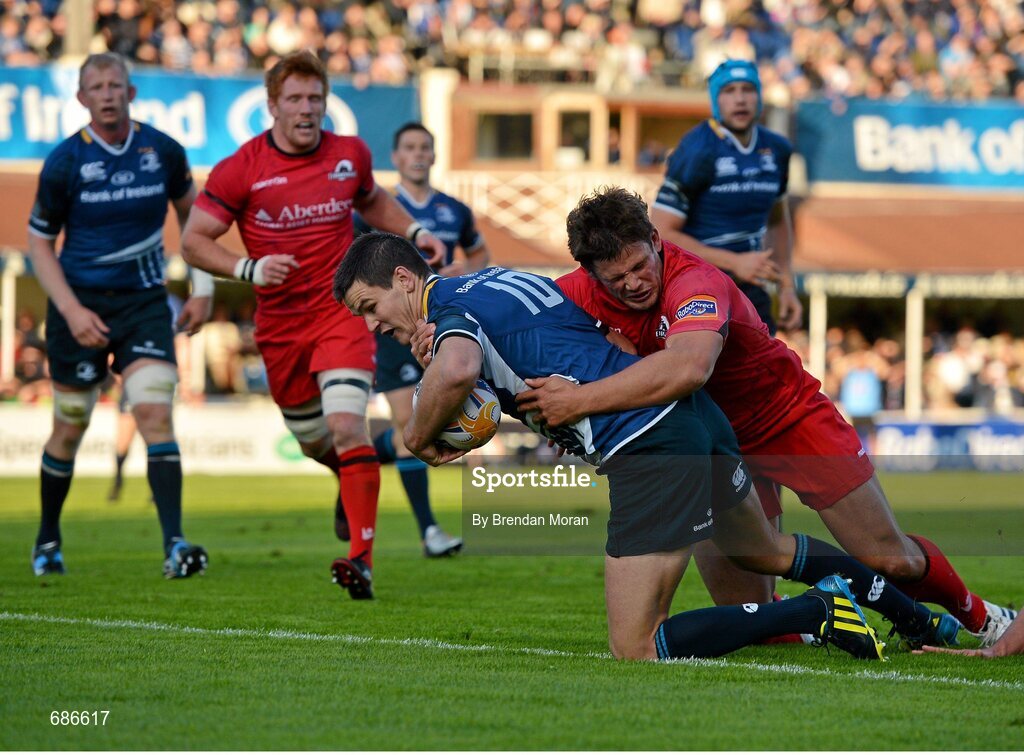 22 September 2012; Jonathan Sexton, Leinster, goes over to score his side's first try despite the tackle of Ross Ford, Edinburgh. Celtic League 2012/13, Round 4, Leinster v Edinburgh, RDS, Ballsbridge, Dublin. Picture credit: Brendan Moran / SPORTSFILE