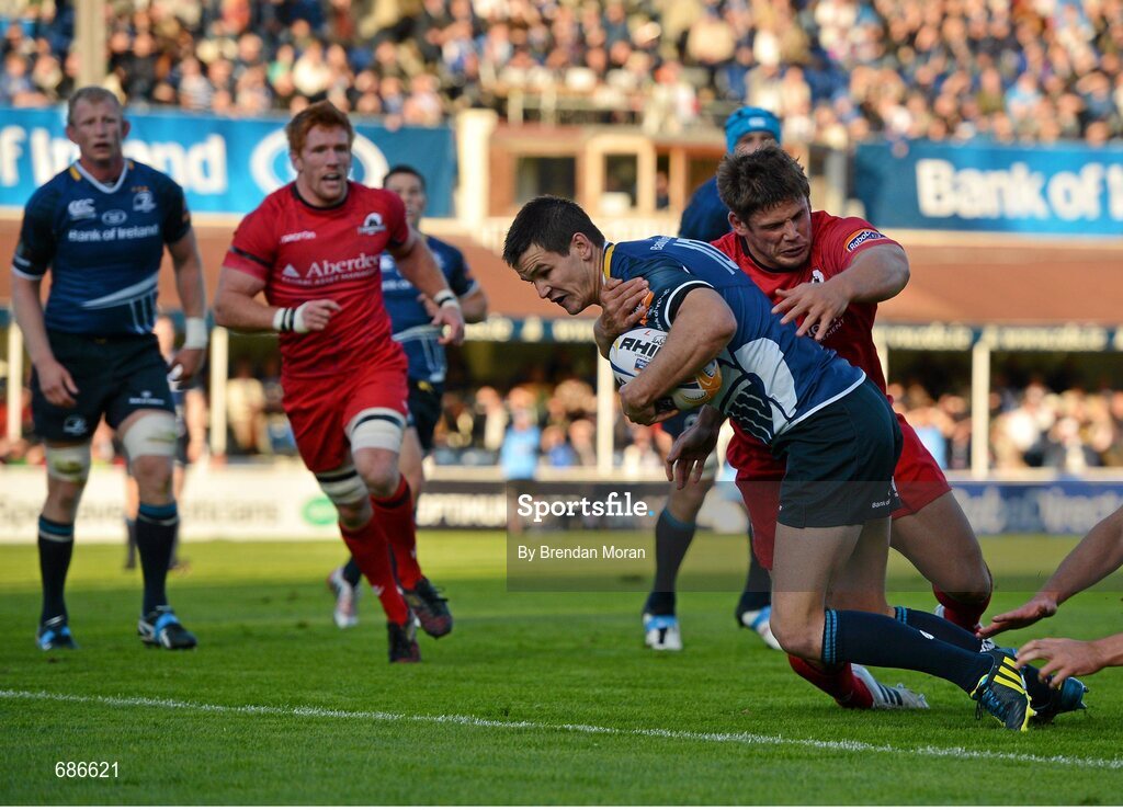 22 September 2012; Jonathan Sexton, Leinster, goes over to score his side's try despite the tackle of Ross Ford, Edinburgh. Celtic League 2012/13, Round 4, Leinster v Edinburgh, RDS, Ballsbridge, Dublin. Picture credit: Brendan Moran / SPORTSFILE