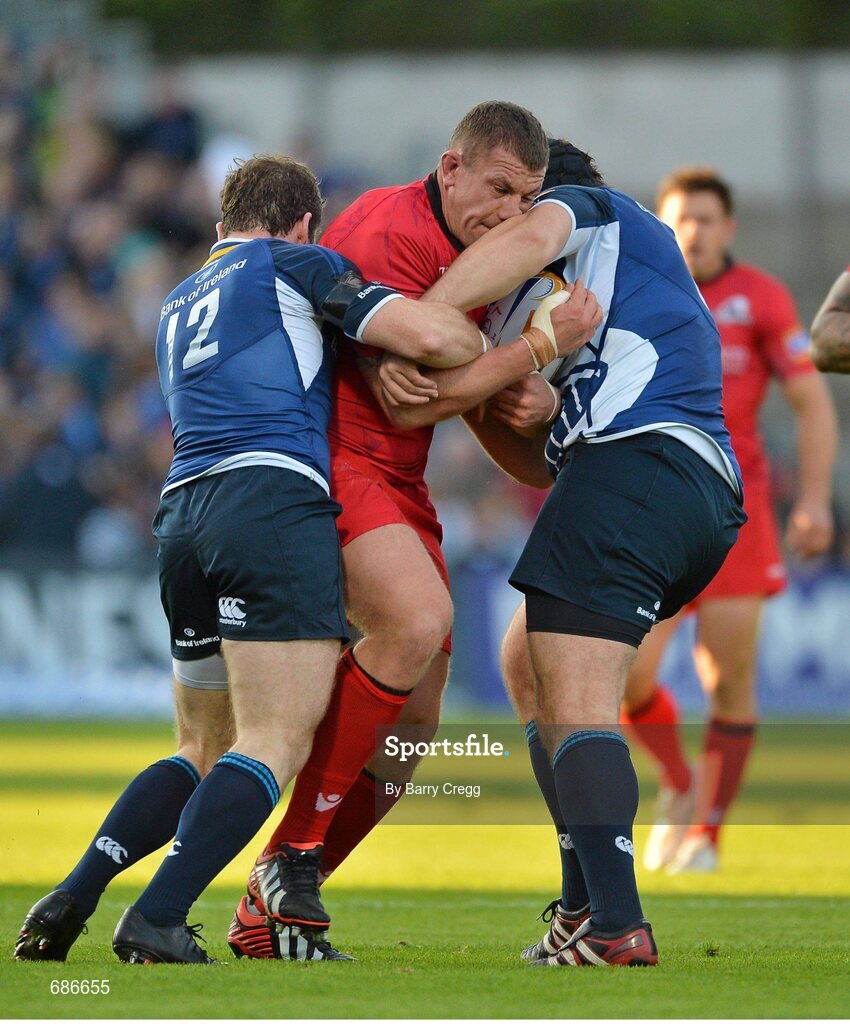 22 September 2012; John Yapp, Edinburgh, is tackled by Gordon D'Arcy, left, and Mike Ross, Leinster. Celtic League 2012/13, Round 4, Leinster v Edinburgh, RDS, Ballsbridge, Dublin. Picture credit: Barry Cregg / SPORTSFILE