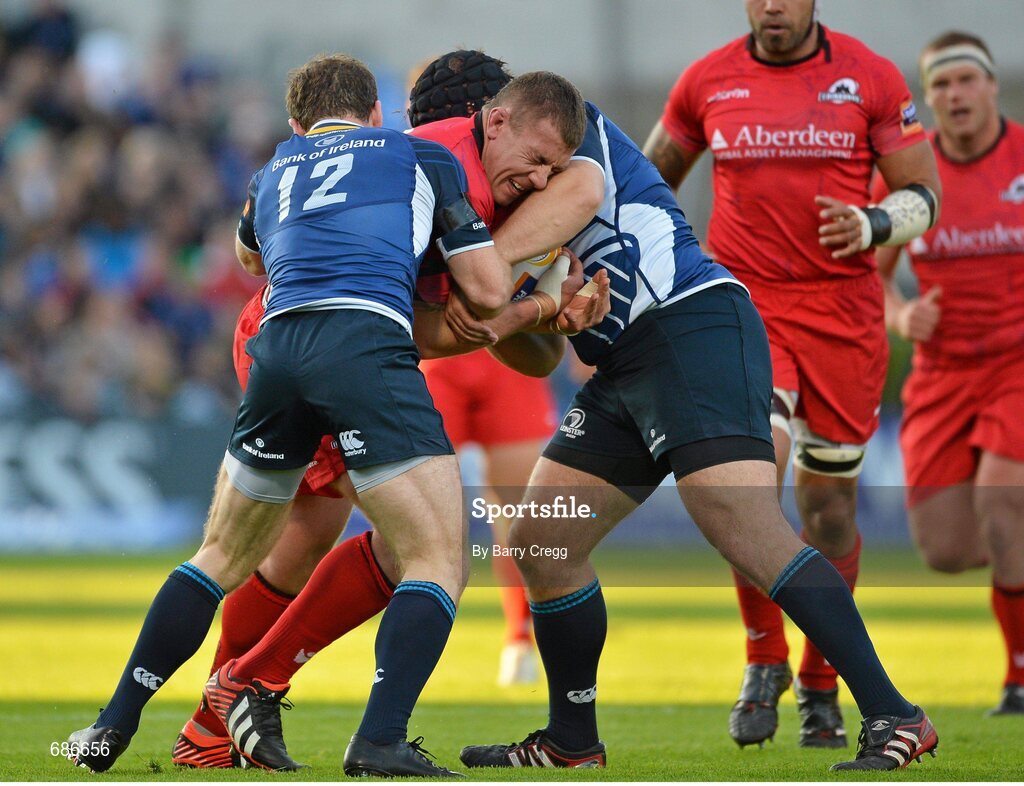 22 September 2012; John Yapp, Edinburgh, is tackled by Gordon D'Arcy, left, and Mike Ross, Leinster. Celtic League 2012/13, Round 4, Leinster v Edinburgh, RDS, Ballsbridge, Dublin. Picture credit: Barry Cregg / SPORTSFILE