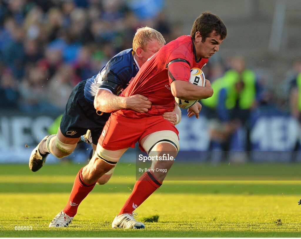 22 September 2012; Stuart McInally, Edinburgh, is tackled by Leo Cullen, Leinster. Celtic League 2012/13, Round 4, Leinster v Edinburgh, RDS, Ballsbridge, Dublin. Picture credit: Barry Cregg / SPORTSFILE