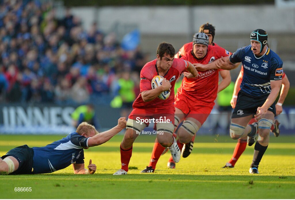 22 September 2012; Stuart McInally, Edinburgh, is tackled by Leo Cullen, Leinster. Celtic League 2012/13, Round 4, Leinster v Edinburgh, RDS, Ballsbridge, Dublin. Picture credit: Barry Cregg / SPORTSFILE