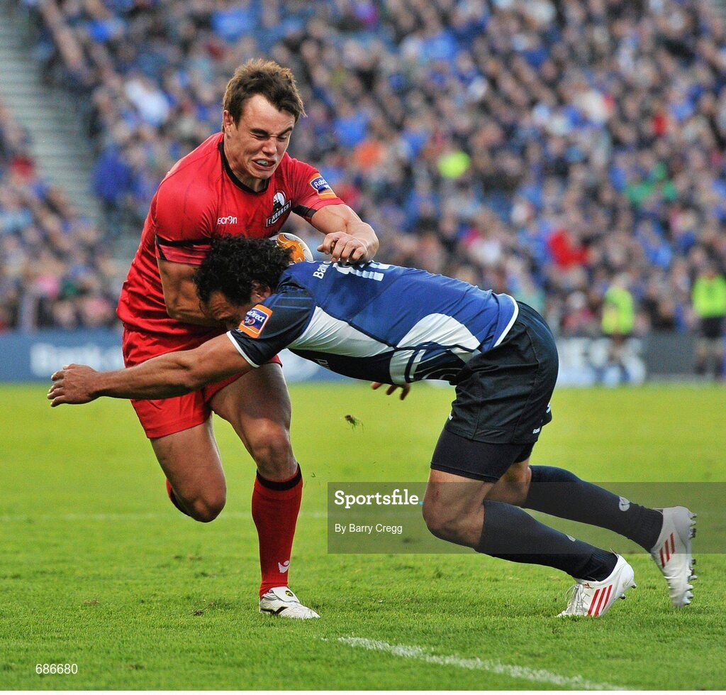 22 September 2012; Nick De Luca, Edinburgh, is tackled by Isa Nacewa, Leinster. Celtic League 2012/13, Round 4, Leinster v Edinburgh, RDS, Ballsbridge, Dublin. Picture credit: Barry Cregg / SPORTSFILE