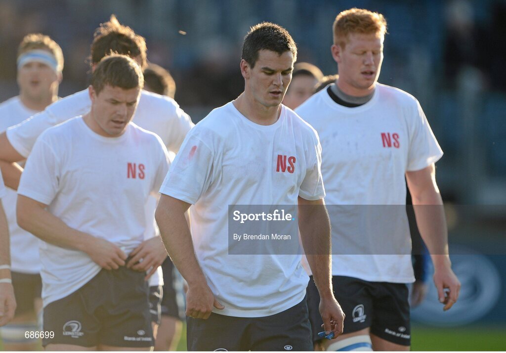22 September 2012; Leinster's Brian O'Driscoll, Jonathan Sexton and Tom Denton leave the pitch after the warm-up before the game wearing tshirts with the initials NS in memory of the late Nevin Spence who played for Ulster. Celtic League 2012/13, Round 4, Leinster v Edinburgh, RDS, Ballsbridge, Dublin. Picture credit: Brendan Moran / SPORTSFILE