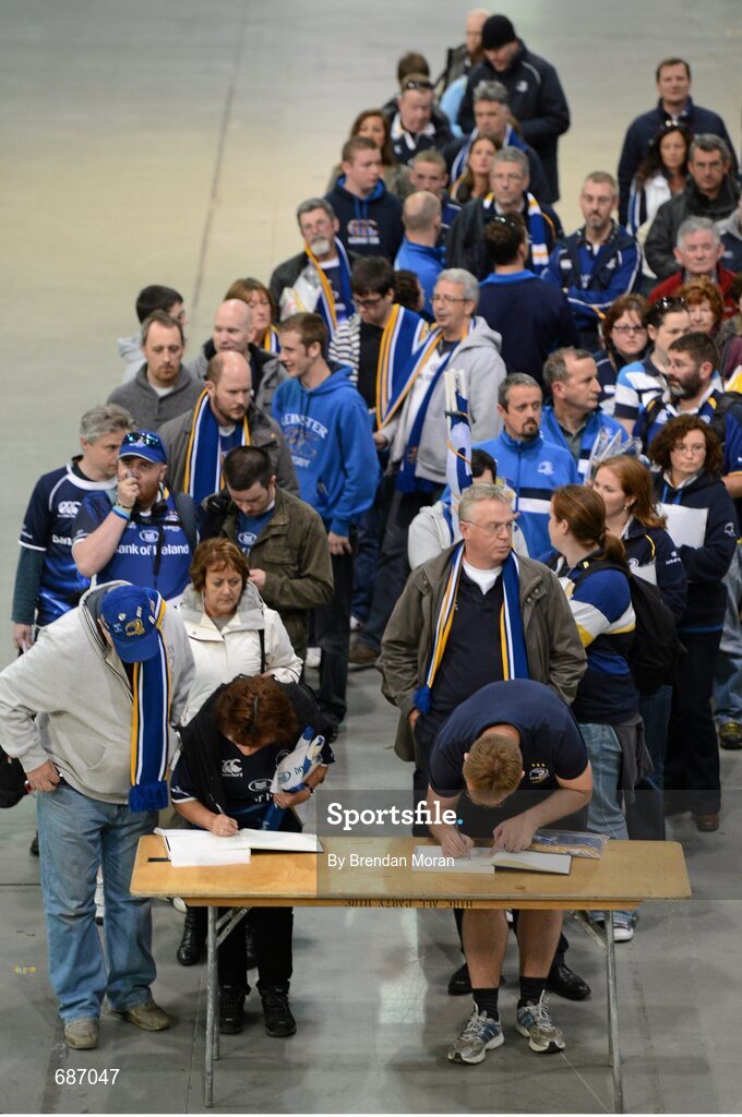 22 September 2012; Leinster supporters queue to sign a book of condolences in memory of the late Ulster Rugby player Nevin Spence. Celtic League 2012/13, Round 4, Leinster v Edinburgh, RDS, Ballsbridge, Dublin. Picture credit: Brendan Moran / SPORTSFILE