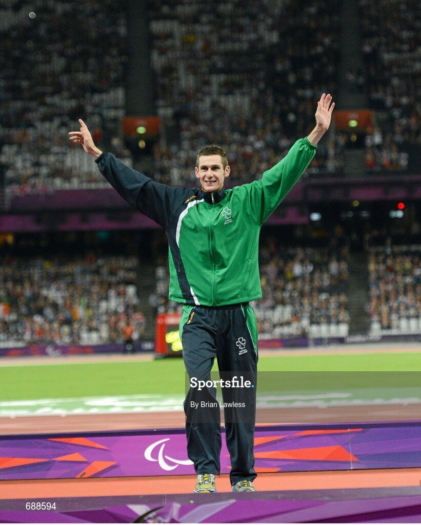 3 September 2012; Ireland's Michael McKillop, from Newtownabbey, Co. Antrim, makes his way onto the podium to receive his Gold medal from his mother Catherine after he won the men's 1500m - T37 final in a time of 4.08:11. London 2012 Paralympic Games, Athletics, Olympic Stadium, Olympic Park, Stratford, London, England. Picture credit: Brian Lawless / SPORTSFILE