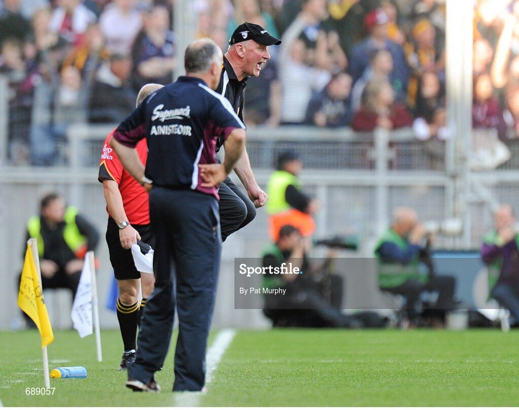 30 September 2012; Kilkenny manager Brian Cody celebrates after Walter Walsh scored his side's second goal of the game as Galway manager Anthony Cunningham, left, looks on. GAA Hurling All-Ireland Senior Championship Final Replay, Kilkenny v Galway, Croke Park, Dublin. Picture credit: Pat Murphy / SPORTSFILE