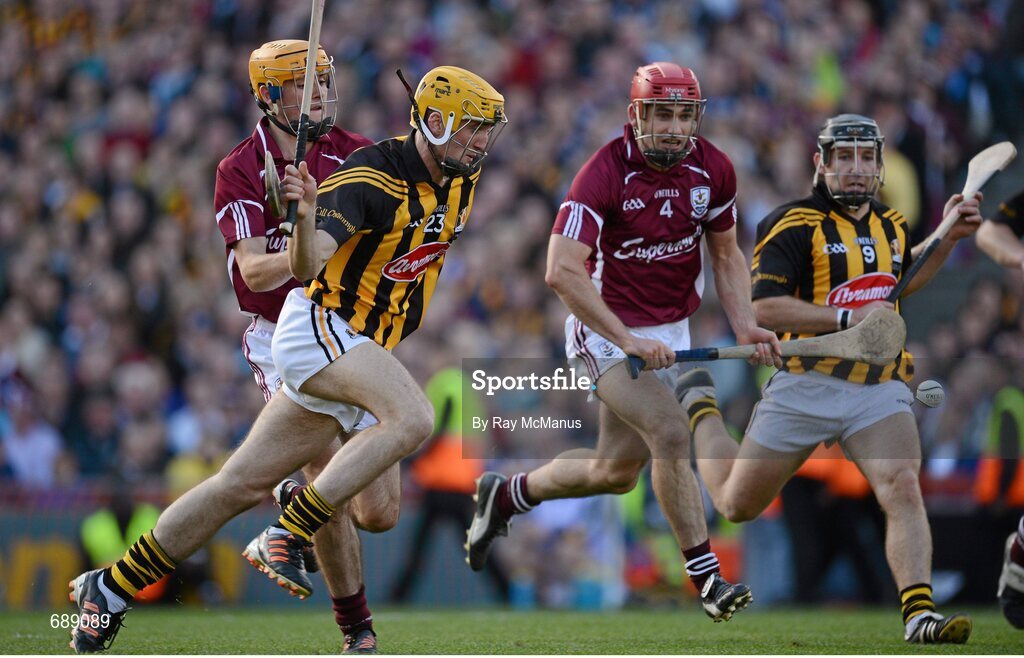 30 September 2012; Colin Fennelly, Kilkenny, scores his side's thrid goal despite the tackle of Johnny Coen, Galway. GAA Hurling All-Ireland Senior Championship Final Replay, Kilkenny v Galway, Croke Park, Dublin. Picture credit: Ray McManus / SPORTSFILE