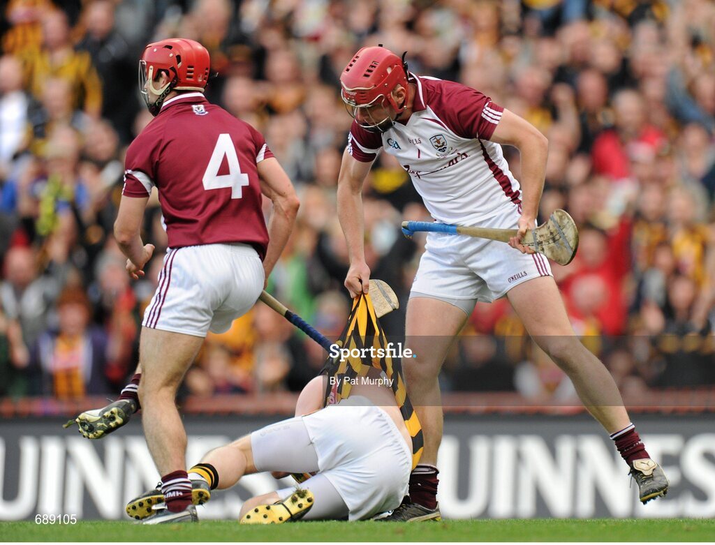 30 September 2012; Galway goalkeeper James Skehill pulls on the jersey of Kilkenny's Richie Power, who lies injured. GAA Hurling All-Ireland Senior Championship Final Replay, Kilkenny v Galway, Croke Park, Dublin. Picture credit: Pat Murphy / SPORTSFILE