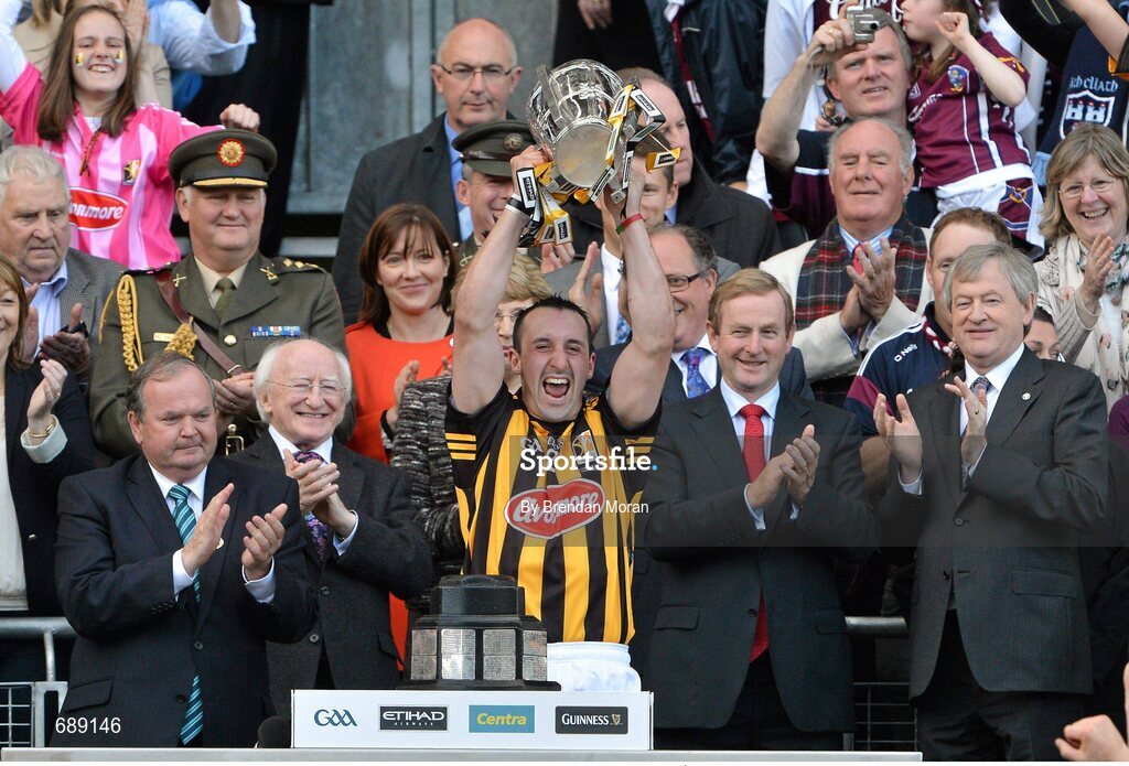 30 September 2012; Kilkenny captain Eoin Larkin lifts the Liam MacCarthy cup in the company of Uachtarán Chumann Lúthchleas Gael Liam Ó Néill, President of Ireland Michael D Higgins, An Taoiseach Enda Kenny TD, and Ard Stiúrthóir of the GAA Páraic Duffy. GAA Hurling All-Ireland Senior Championship Final Replay, Kilkenny v Galway, Croke Park, Dublin. Picture credit: Brendan Moran / SPORTSFILE