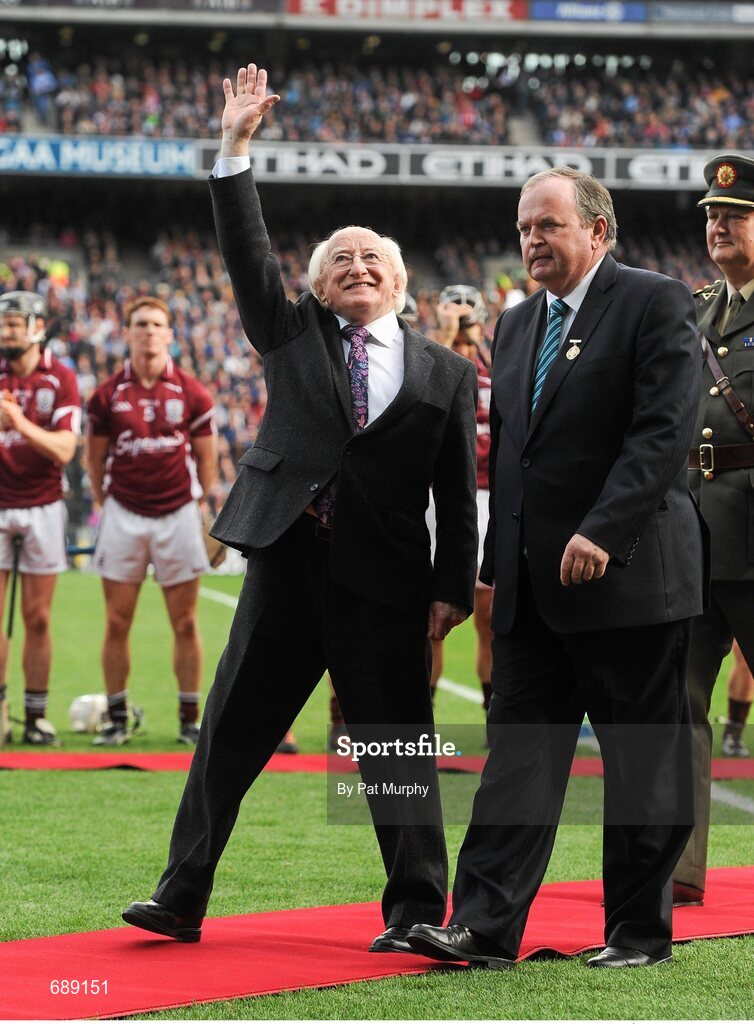 30 September 2012; President of Ireland Michael D. Higgins waves to the crowd after meeting the teams alongside Uachtarán Chumann Lúthchleas Gael Liam Ó Néill, right. GAA Hurling All-Ireland Senior Championship Final Replay, Kilkenny v Galway, Croke Park, Dublin. Picture credit: Pat Murphy / SPORTSFILE