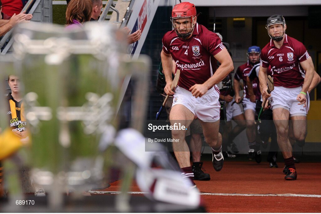 30 September 2012; Fergal Moore, Galway captain and Tony Og Regan, run out from their team dressing room and pass the  Liam MacCarthy cup before the start of the game. GAA Hurling All-Ireland Senior Championship Final Replay, Kilkenny v Galway, Croke Park, Dublin. Picture credit: David Maher / SPORTSFILE