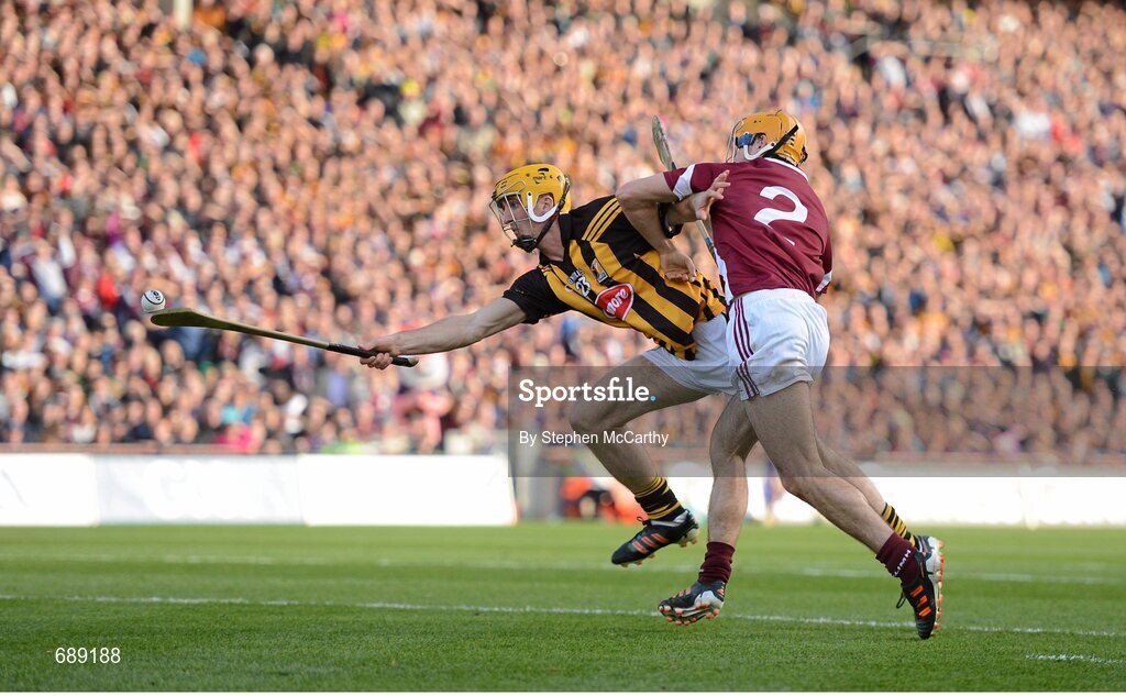 30 September 2012; Colin Fennelly, Kilkenny, is tackled by Johnny Coen, Galway, on his way to scoring his side's third goal. GAA Hurling All-Ireland Senior Championship Final Replay, Kilkenny v Galway, Croke Park, Dublin. Picture credit: Stephen McCarthy / SPORTSFILE