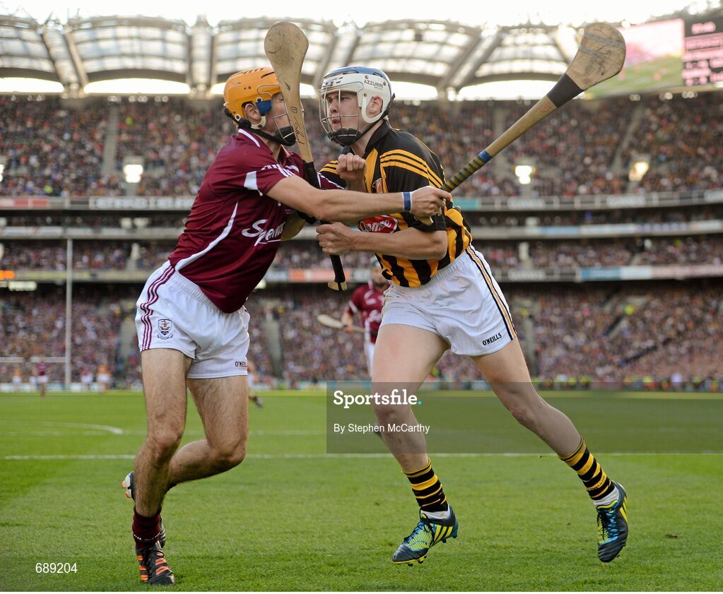 30 September 2012; T.J. Reid, Kilkenny, in action against Johnny Coen, Galway. GAA Hurling All-Ireland Senior Championship Final Replay, Kilkenny v Galway, Croke Park, Dublin. Picture credit: Stephen McCarthy / SPORTSFILE