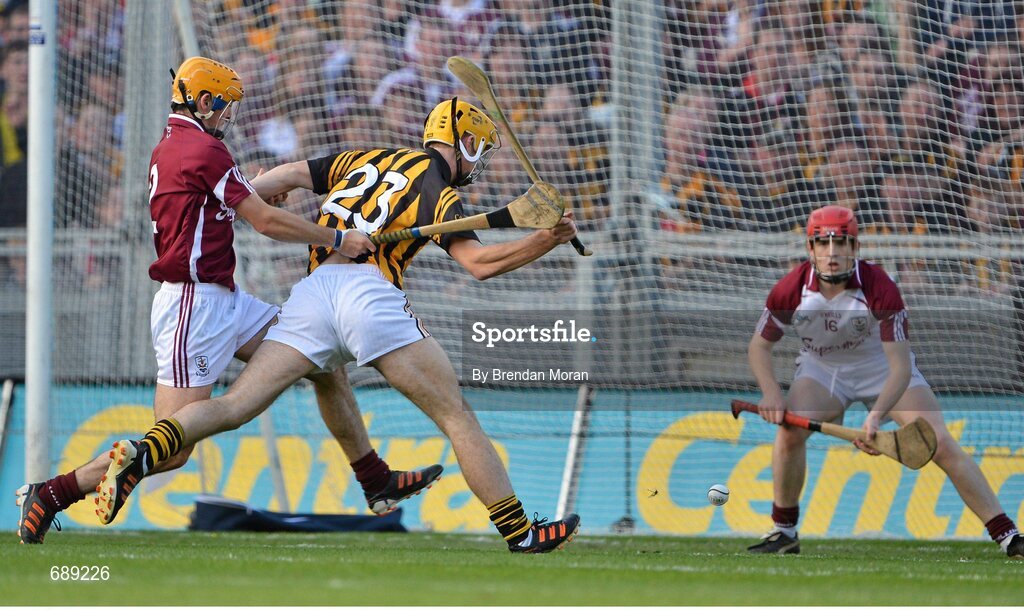 30 September 2012; Colin Fennelly, Kilkenny, holds off the challenge of Galway's Johnny Coen on the way to scoring his side's third goal. GAA Hurling All-Ireland Senior Championship Final Replay, Kilkenny v Galway, Croke Park, Dublin. Picture credit: Brendan Moran / SPORTSFILE