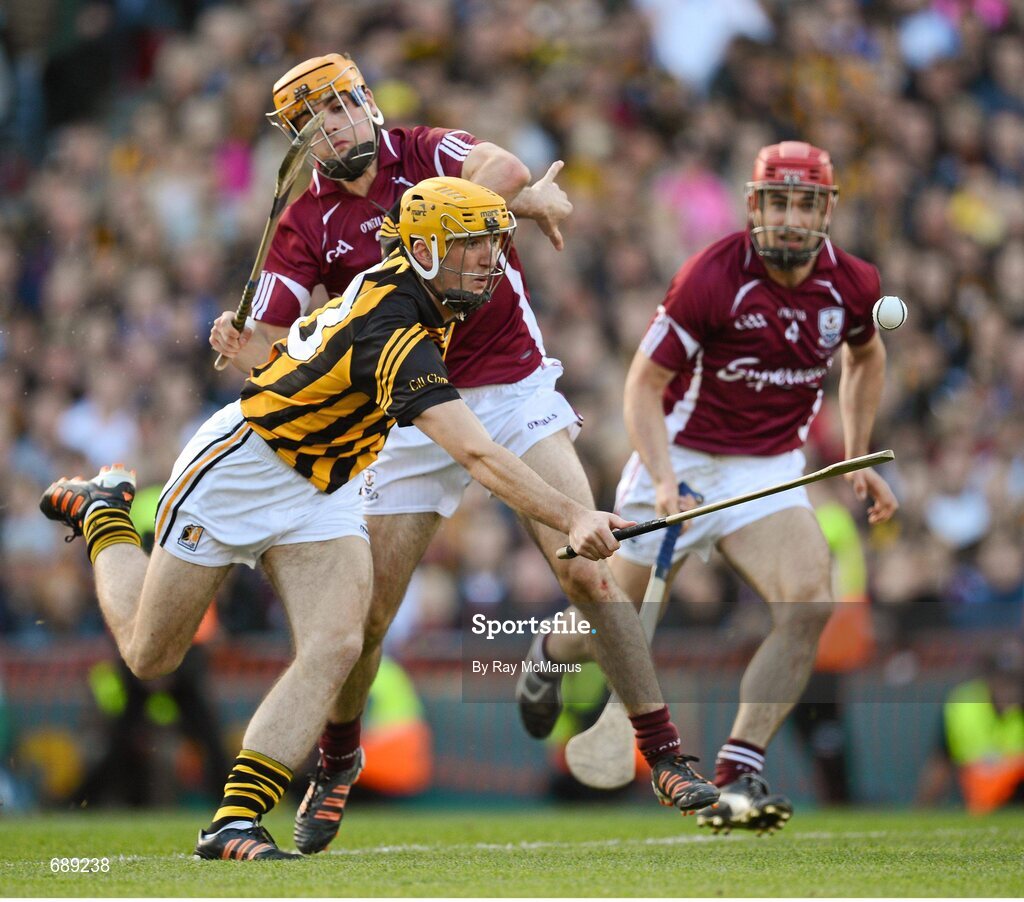 30 September 2012; Colin Fennelly, Kilkenny, on his way to scoring his side's third goal despite the tackle of Johnny Coen, Galway. GAA Hurling All-Ireland Senior Championship Final Replay, Kilkenny v Galway, Croke Park, Dublin. Picture credit: Ray McManus / SPORTSFILE