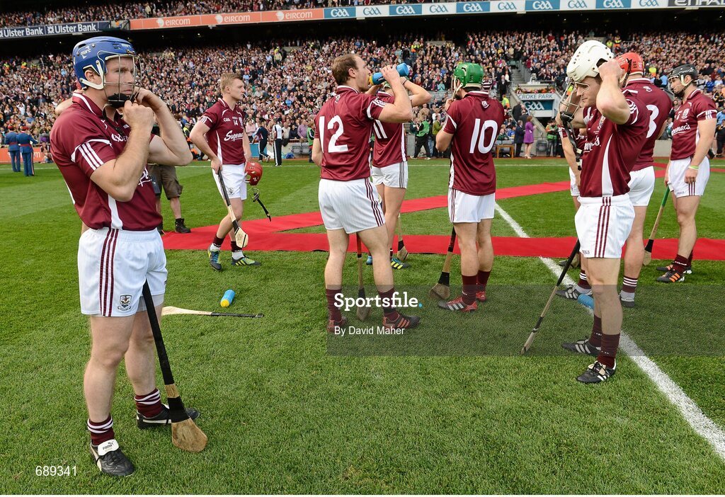 30 September 2012; Damien Hayes, left, and Andrew Smith, Galway, put on their helmets before the start of the game. GAA Hurling All-Ireland Senior Championship Final Replay, Kilkenny v Galway, Croke Park, Dublin. Picture credit: David Maher / SPORTSFILE