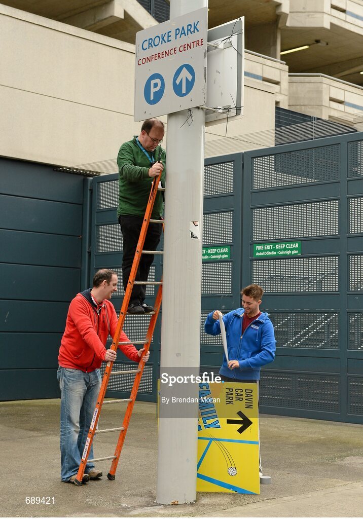 30 September 2012; Staff hang signposts indicating the location of the Family Funzone early on the morning of the game. GAA Hurling All-Ireland Senior Championship Final Replay, Kilkenny v Galway, Croke Park, Dublin. Picture credit: Brendan Moran / SPORTSFILE