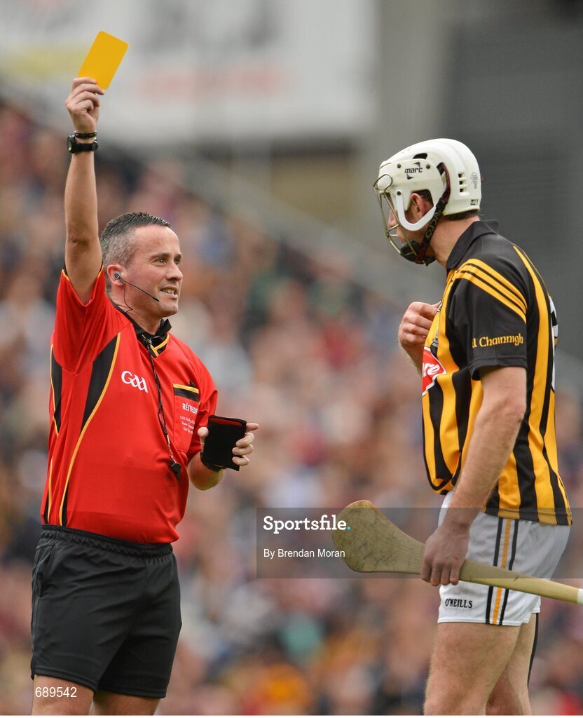 30 September 2012; Michael Fennelly, Kilkenny, is shown a yellow card by referee James McGrath, Galway. GAA Hurling All-Ireland Senior Championship Final Replay, Kilkenny v Galway, Croke Park, Dublin. Picture credit: Brendan Moran / SPORTSFILE