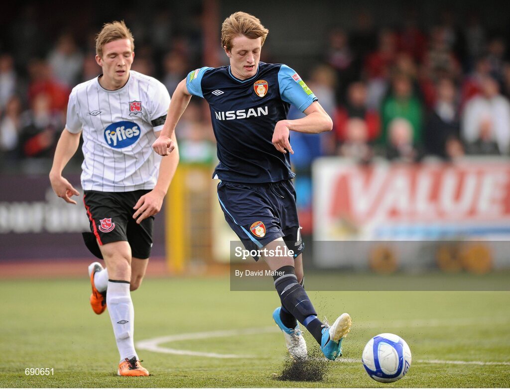 7 October 2012; Chris Forrester, St. Patrick's Athletic, in action against Michael Rafter, Dundalk. FAI Ford Cup semi-final, Dundalk v St Patrick’s Athletic, Oriel Park, Dundalk, Co. Louth.Picture credit: David Maher / SPORTSFILE