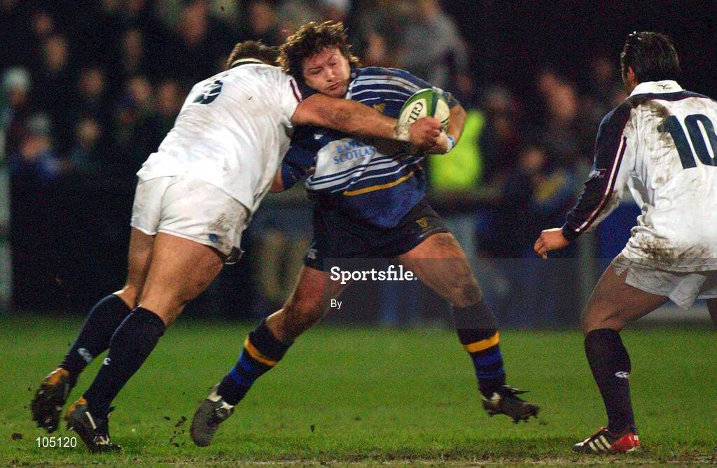10 January 2003; Shane Byrne, Leinster is tackled by Dan Dorsey, Swansea. Leinster v Swansea, Heineken European Rugby Cup, Donnybrook, Dublin. Picture credit; Damien Eagers / SPORTSFILE *EDI*