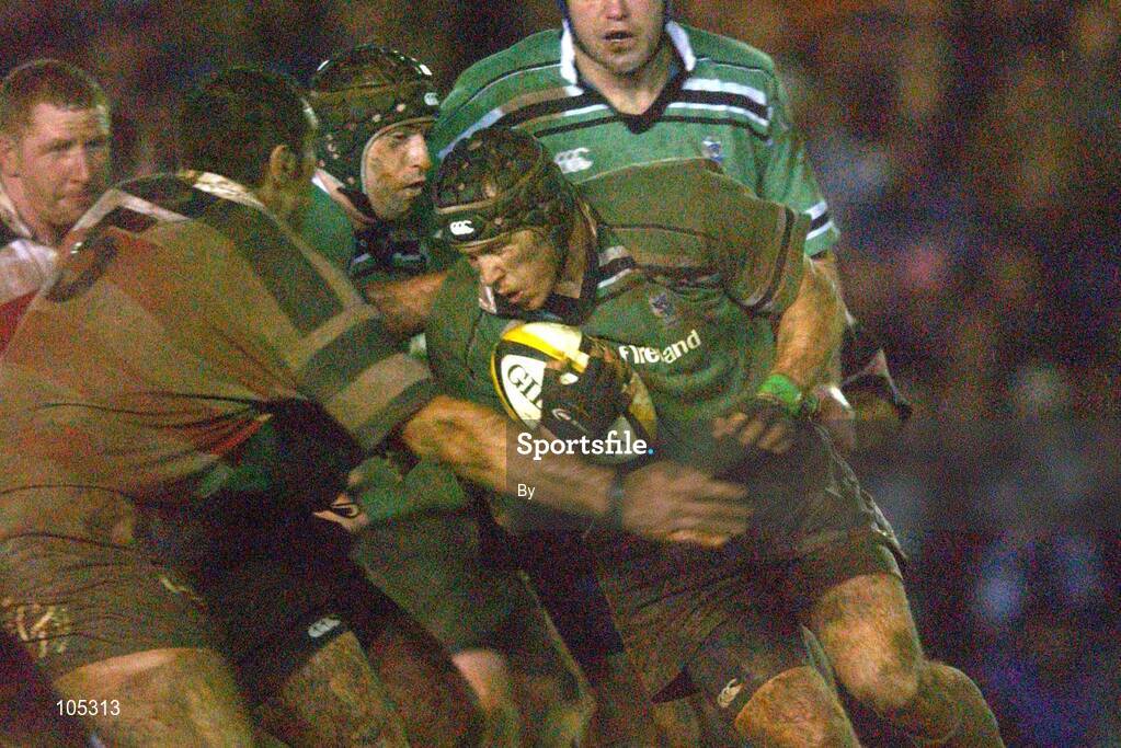 18 January 2002; Rowan Frost, Connacht, is tackled by Robert Sidoli, Pontypridd. Parker Pen Challenge Cup Quarter Final Second Leg, Pontypridd v Connacht, Rugby, Sardis Road, Pontypridd, Wales. Picture credit; Damien Eagers / SPORTSFILE *EDI*